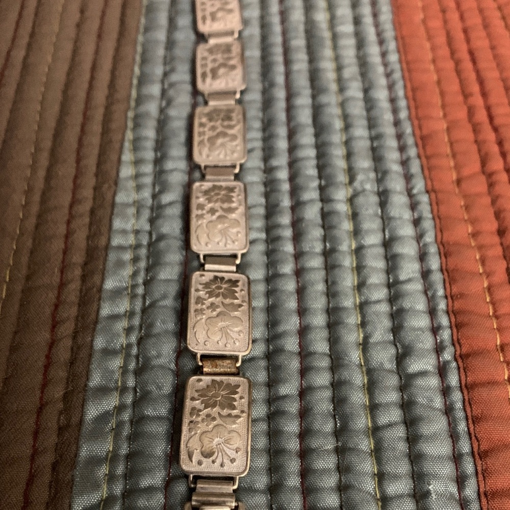 Sterling silver floral/panel bracelet. 835 Pure

Pictured